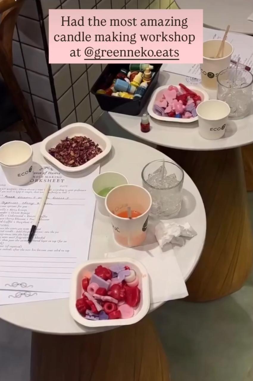 Guests making scented iced latte candles at Green Neko